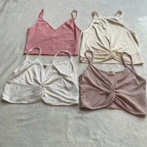 Four tops, Brandy Melville, Aqua, and Garage.  XS, S, and Medium